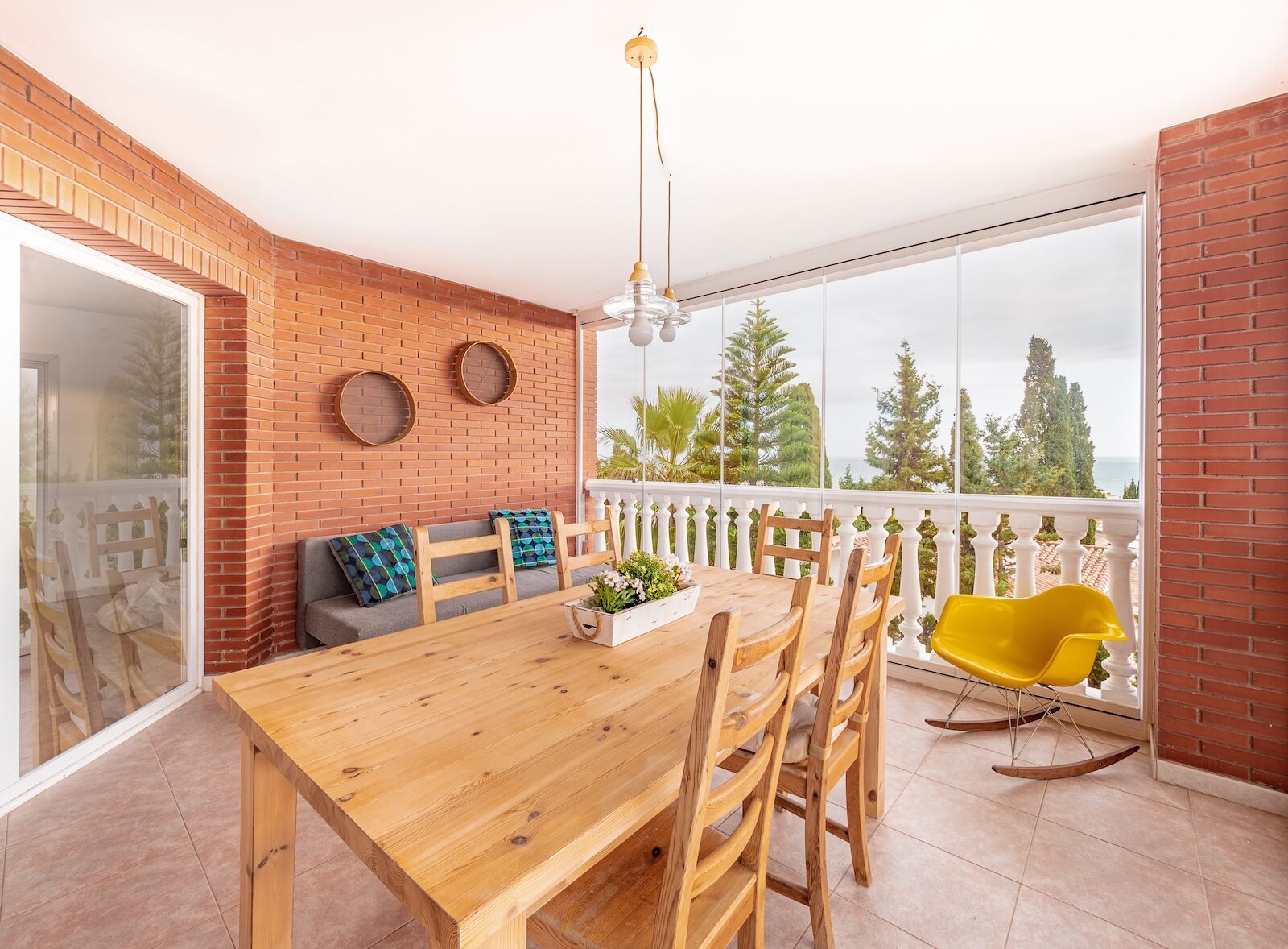 patio with table overlooking forest at airbnb rental home