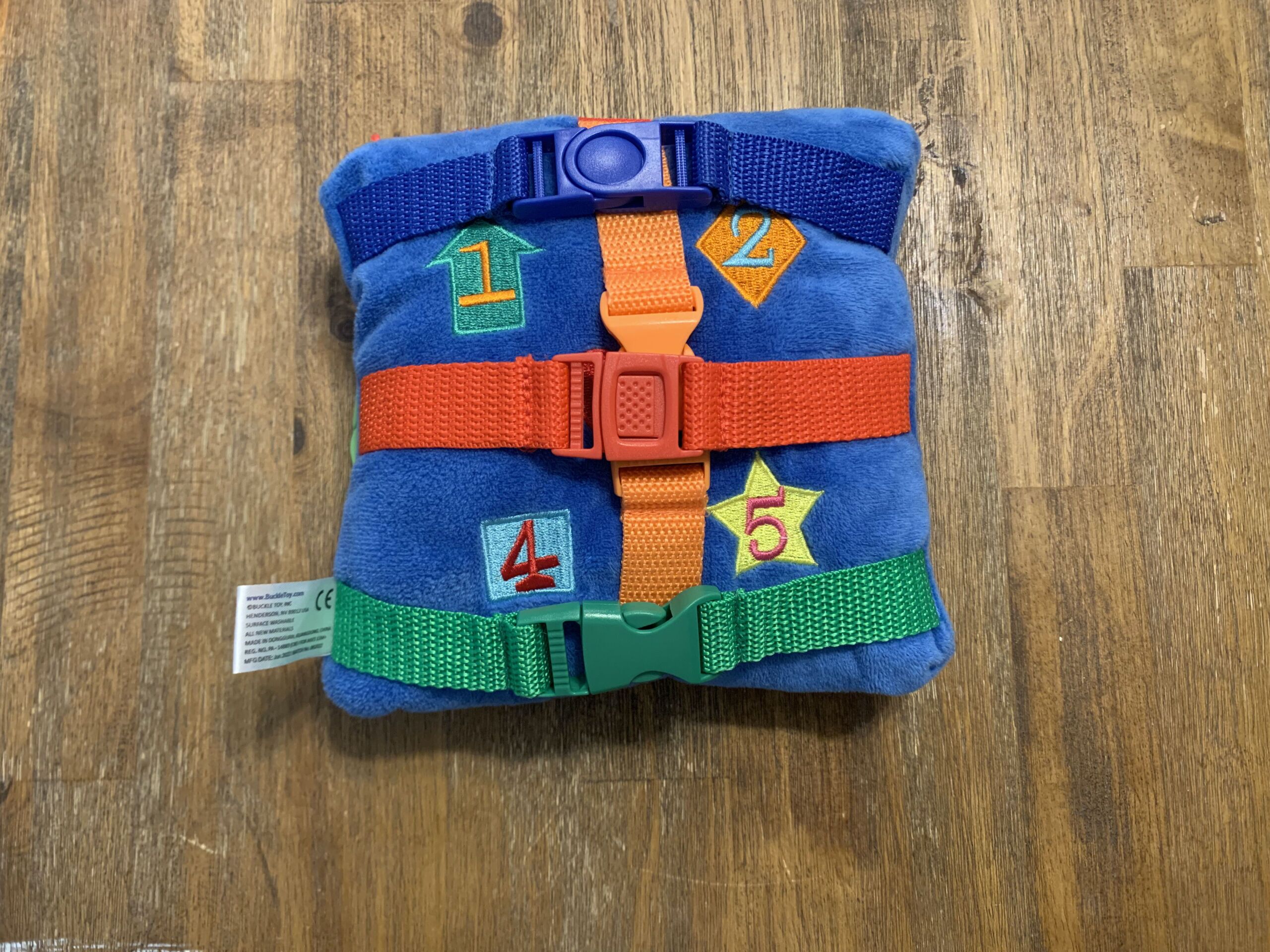 blue buckle pillow for flight with toddler