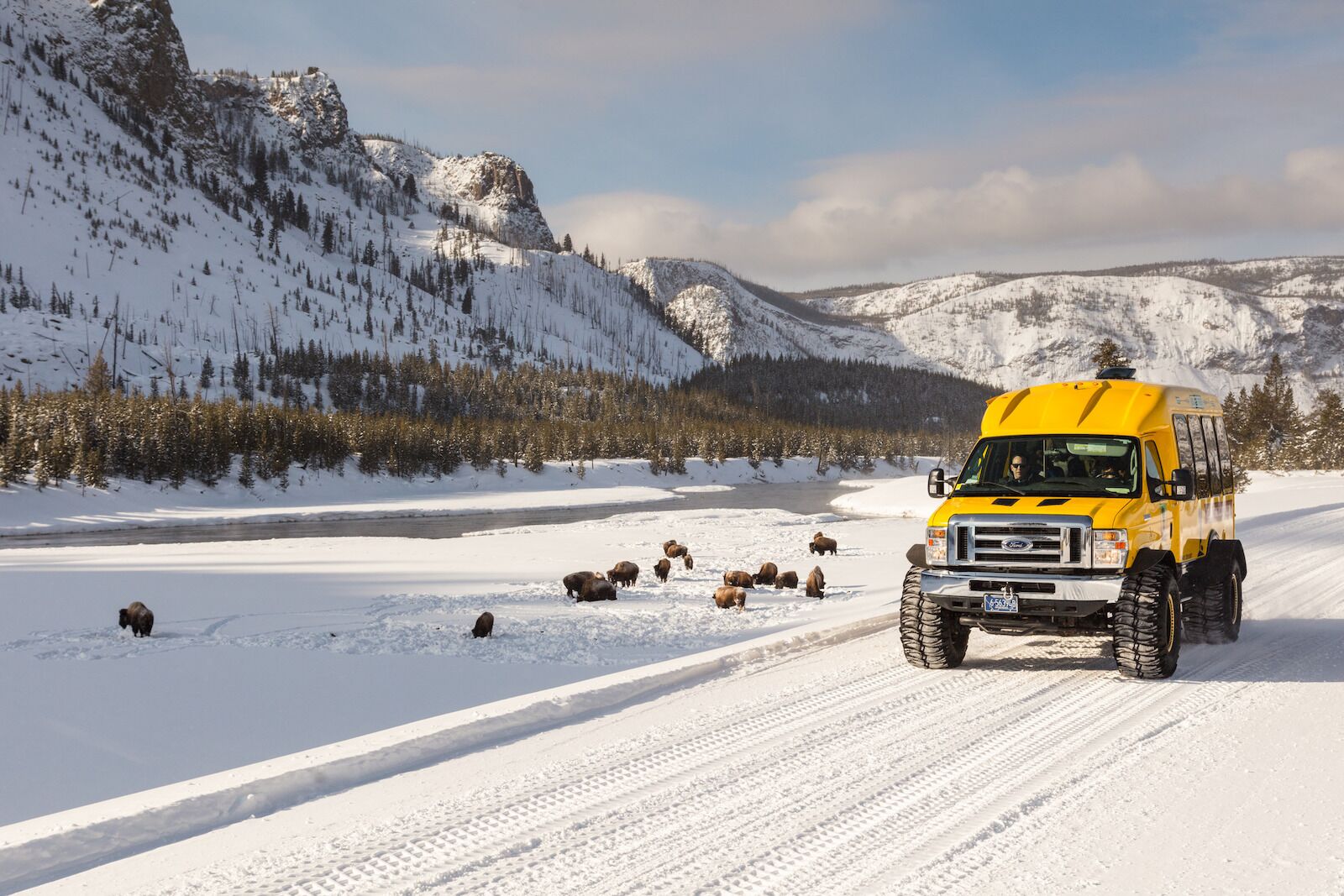 snowcoach in winter best tiume to visit yellowstone