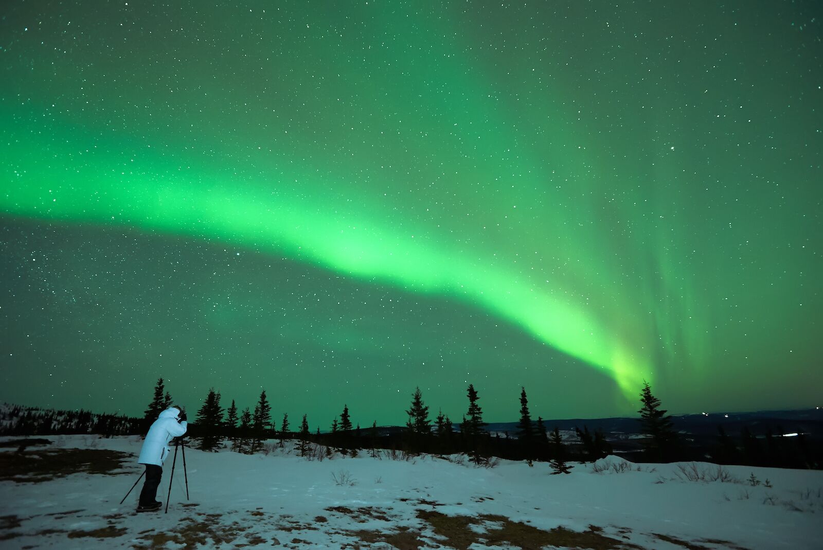 Person Photographing the Aurora Borealis