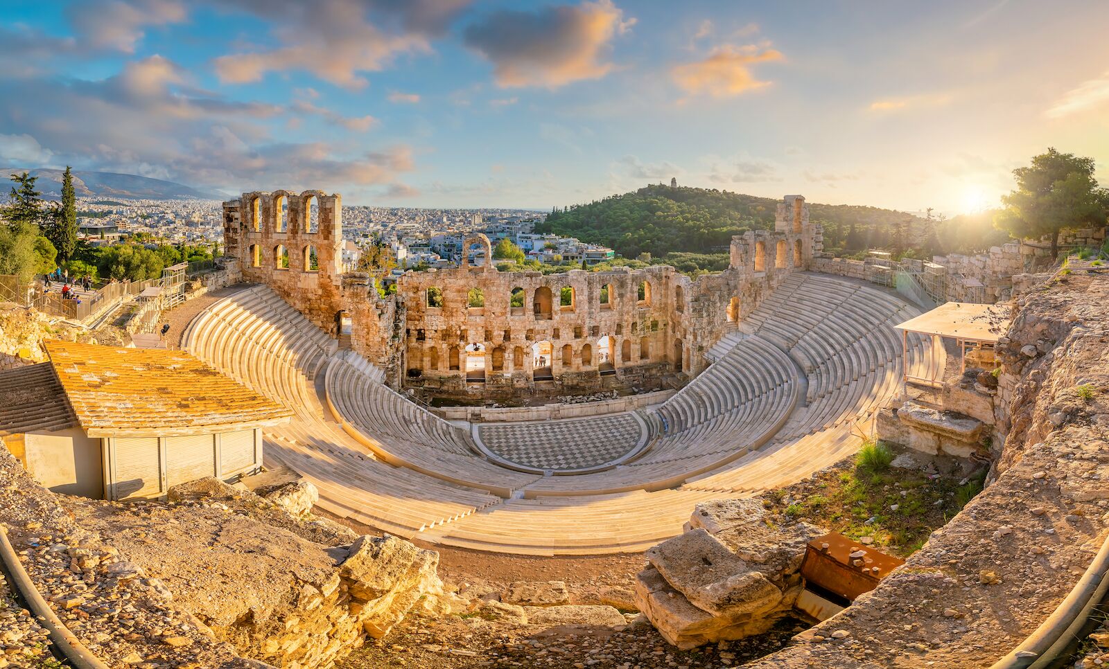 Best time to visit Greece: Large open-air theatre in Athens, Greece, on the Acropolis. The theater is called The Odeon of Herodes Atticus 