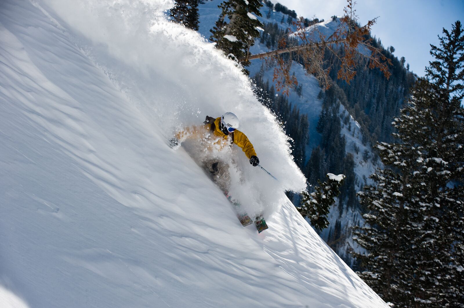 A skier on a steep slope during a ski trip to Alta in Utah