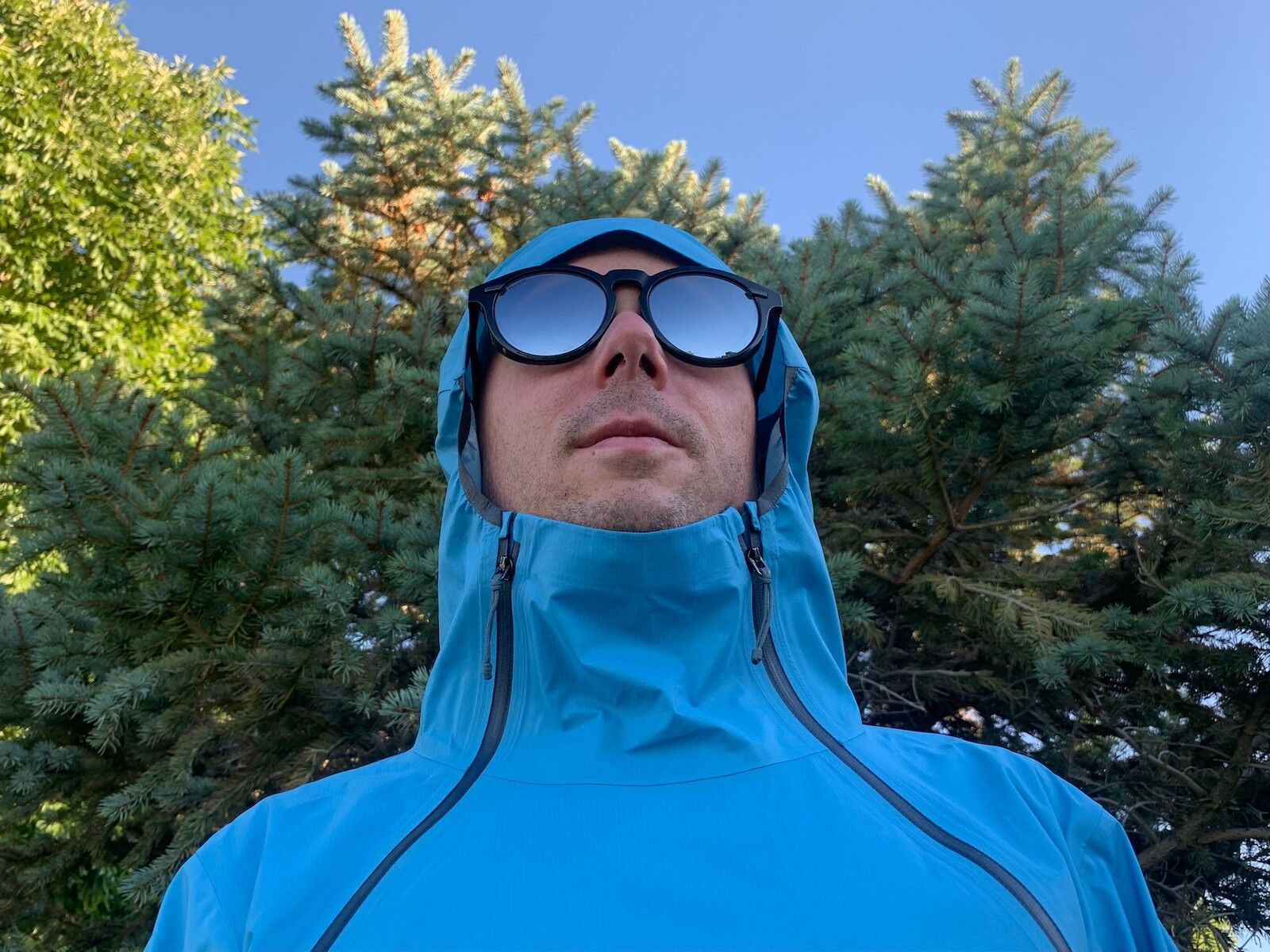 man in blue patagonia storm racer jacket
