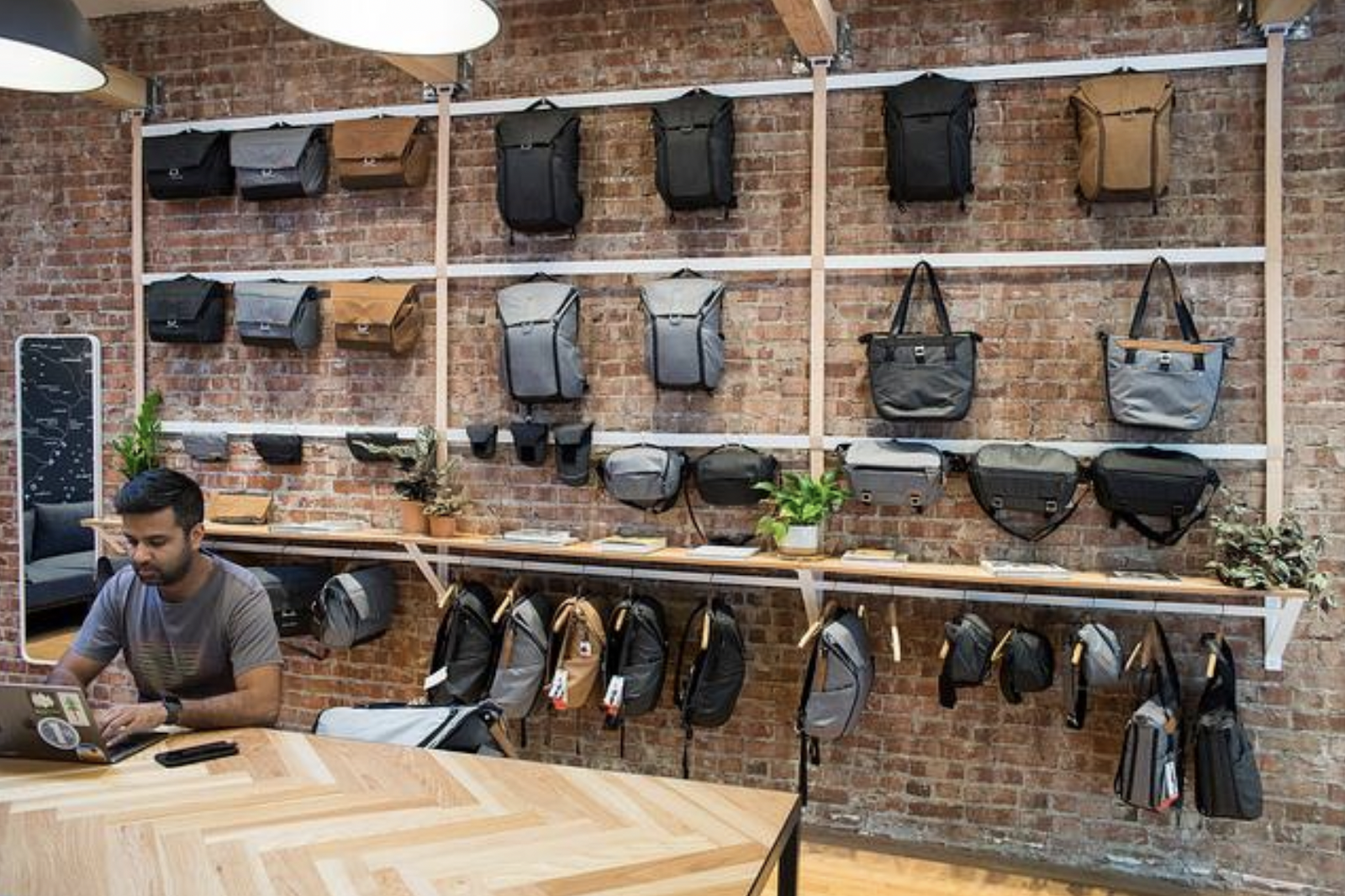 wall of peak design travel backpacks and other products