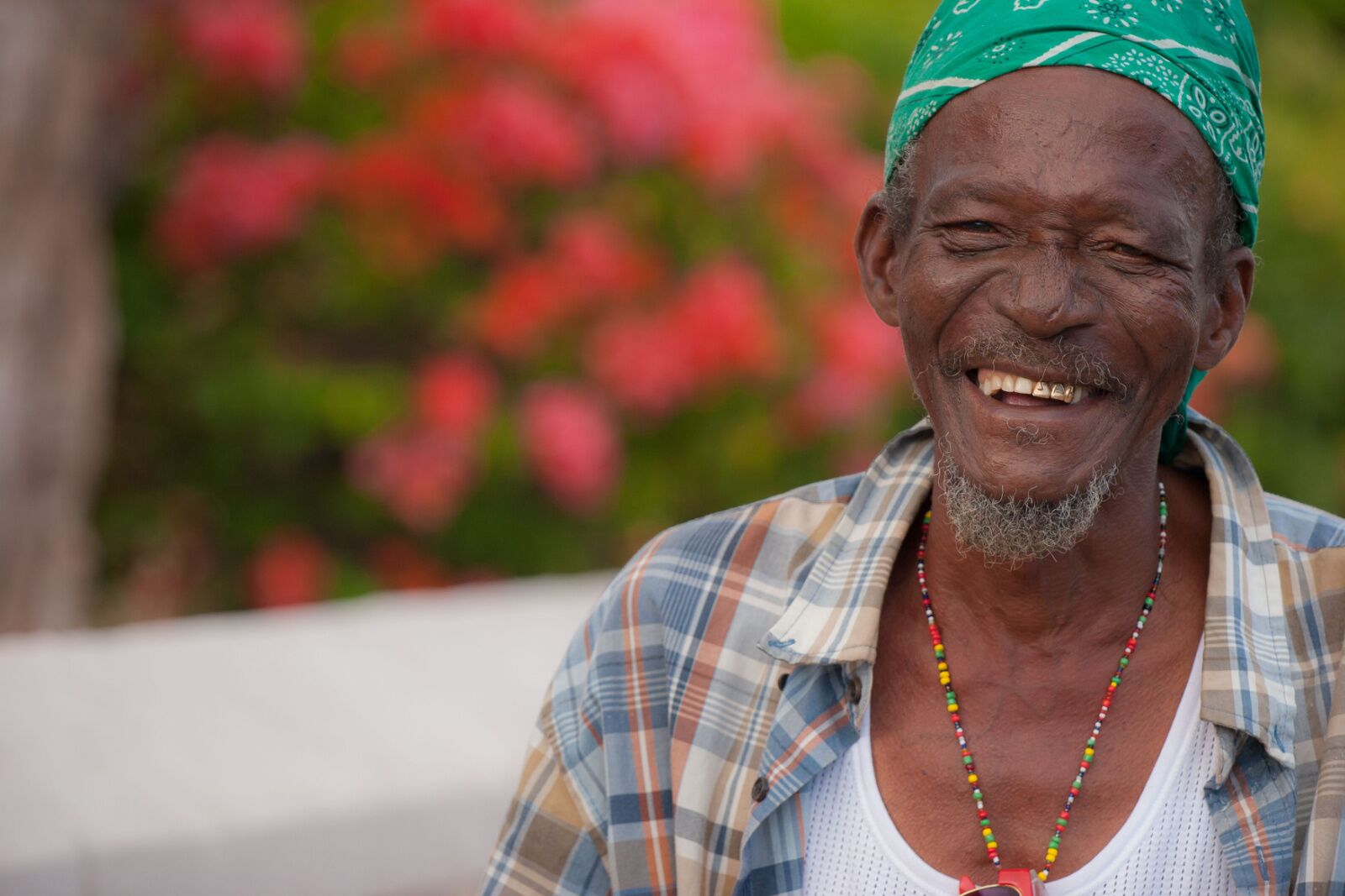 A close up portrait of a Rastafari man in Jamaica's blue mountains