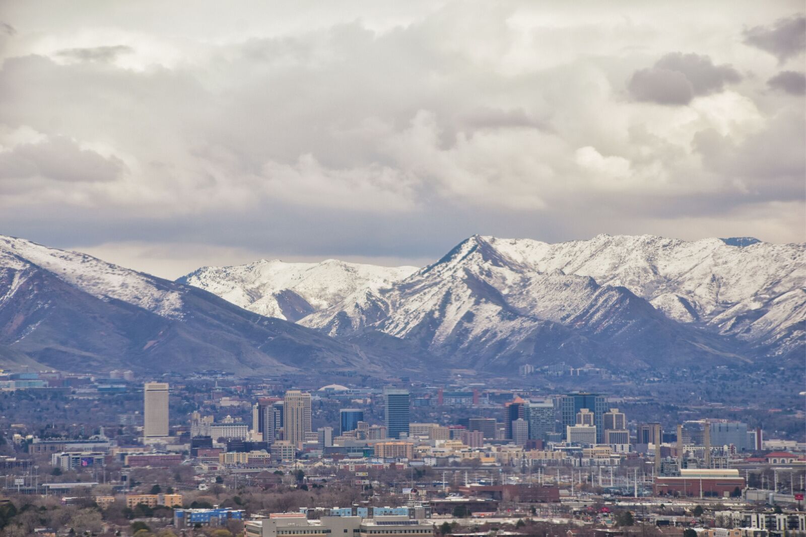 Salt Lake City with the mountains towering behind -- a good place for a ski trip