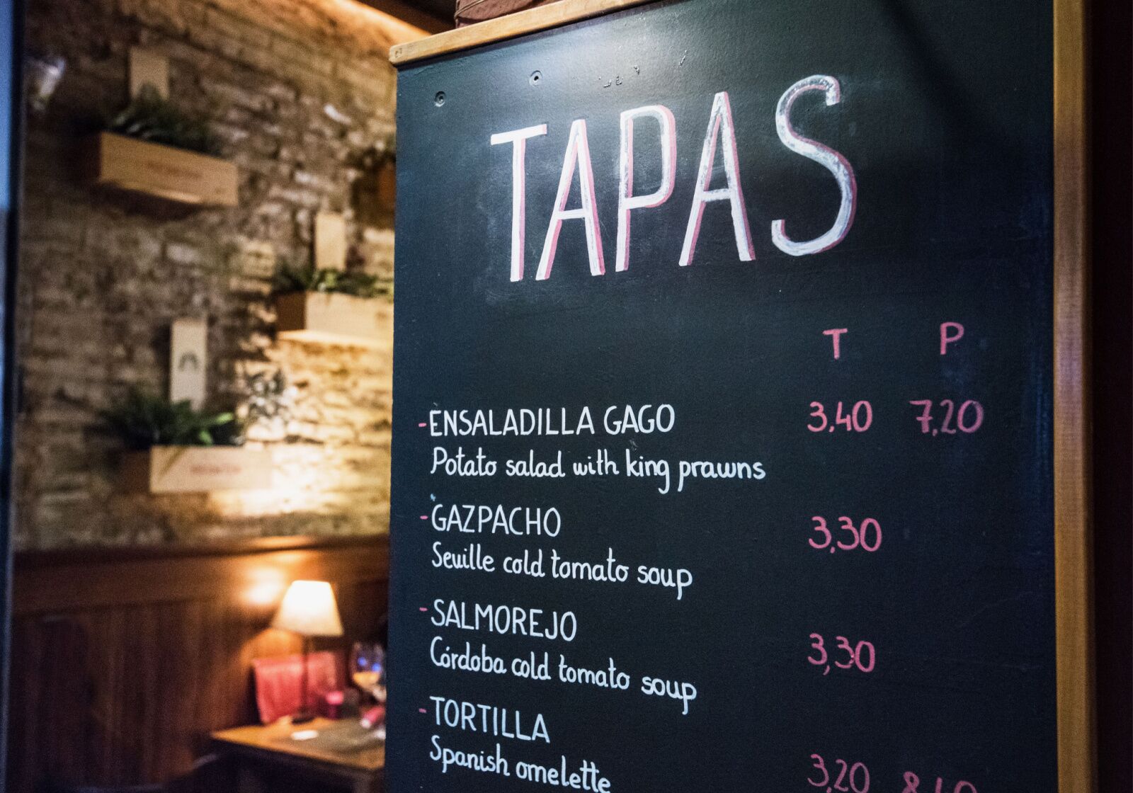 A closeup of a tapas menu in Seville, Spain