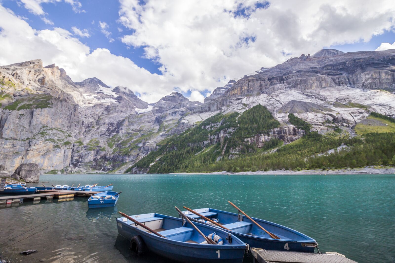 boats on the water at Oeschinen Lake