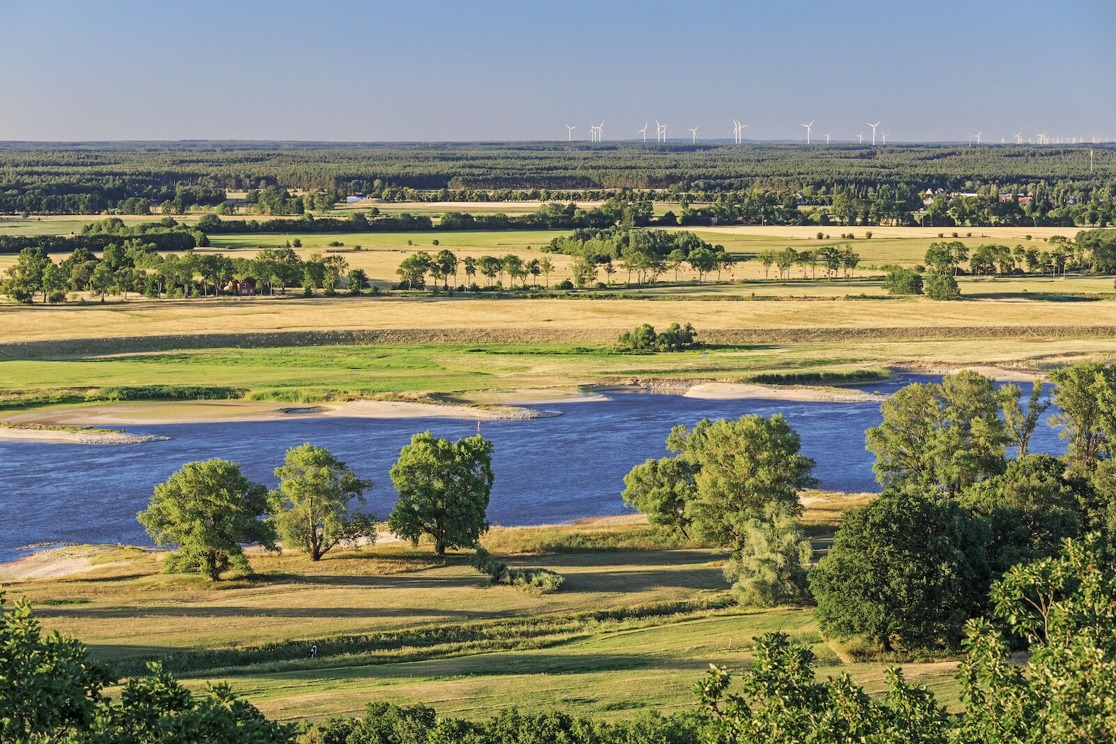 Valley of the river Elbe near Höhbeck in Lower Saxony (Brandenburg on the far side of the river), Germany, with pastures, meadows and forests. Biosphere reserve river landscape Elbe.