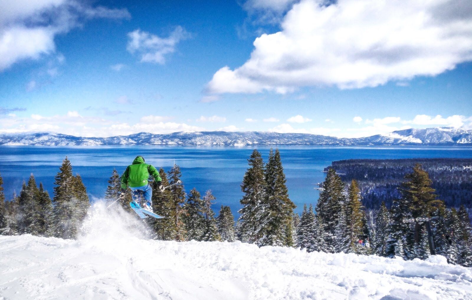 skier getting air at homewood, one of the lake tahoe ski resorts