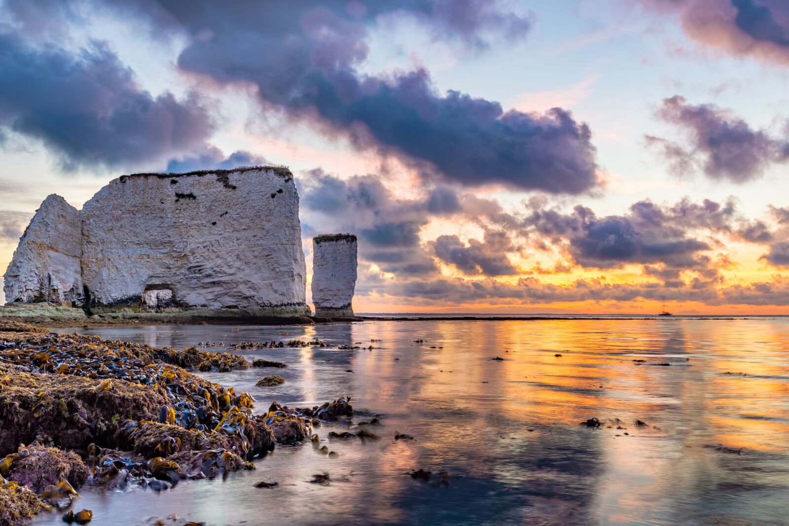Old Harry Rocks at sunset, color on water