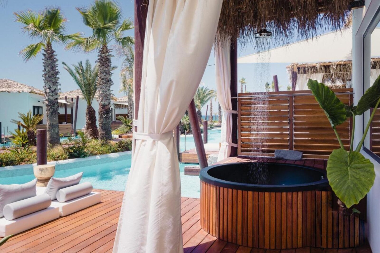 Outdoor hot tub at Stella Island Luxury Resort and Spa