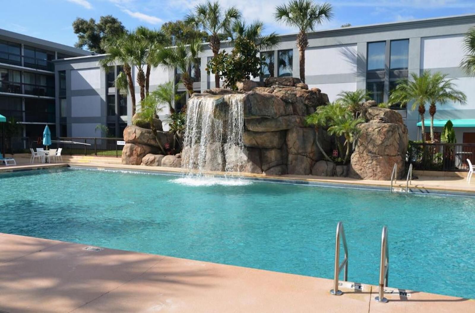 10 Cheap Hotels In Orlando FL For A Budget Family Vacation   Opal Hotel Suites Pool  