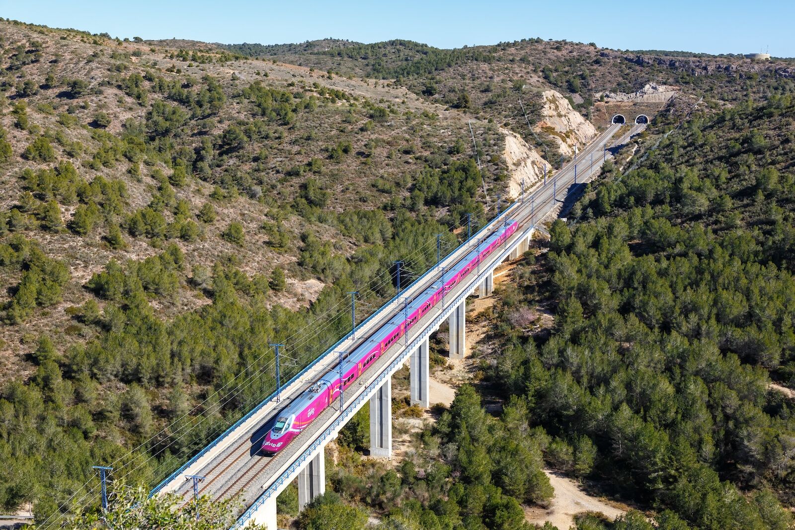 AVLO train that runs between Madrid and Barcelona on a bridge