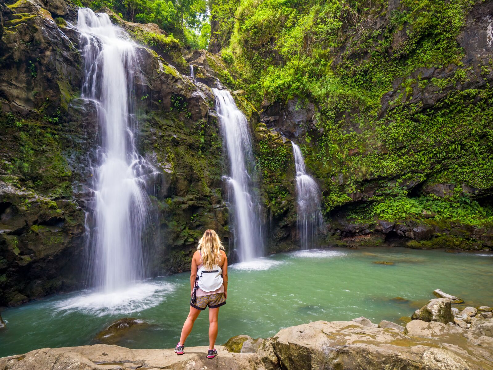 things to do on maui - woman at waterfall 