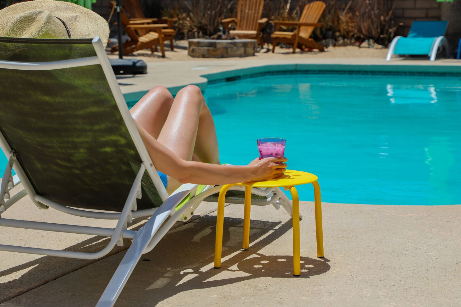 woman at pool in palm springs