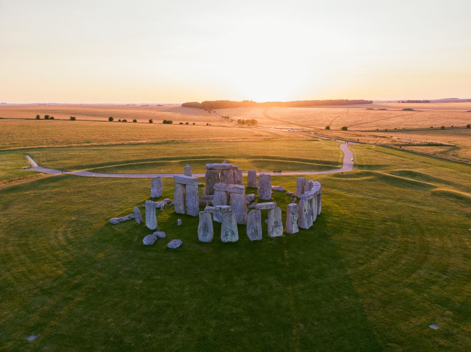Stonehenge in pink and soft sunlight from above