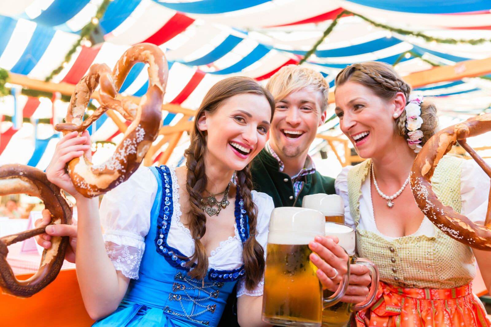 festivals in munich, germany -people with pretzels