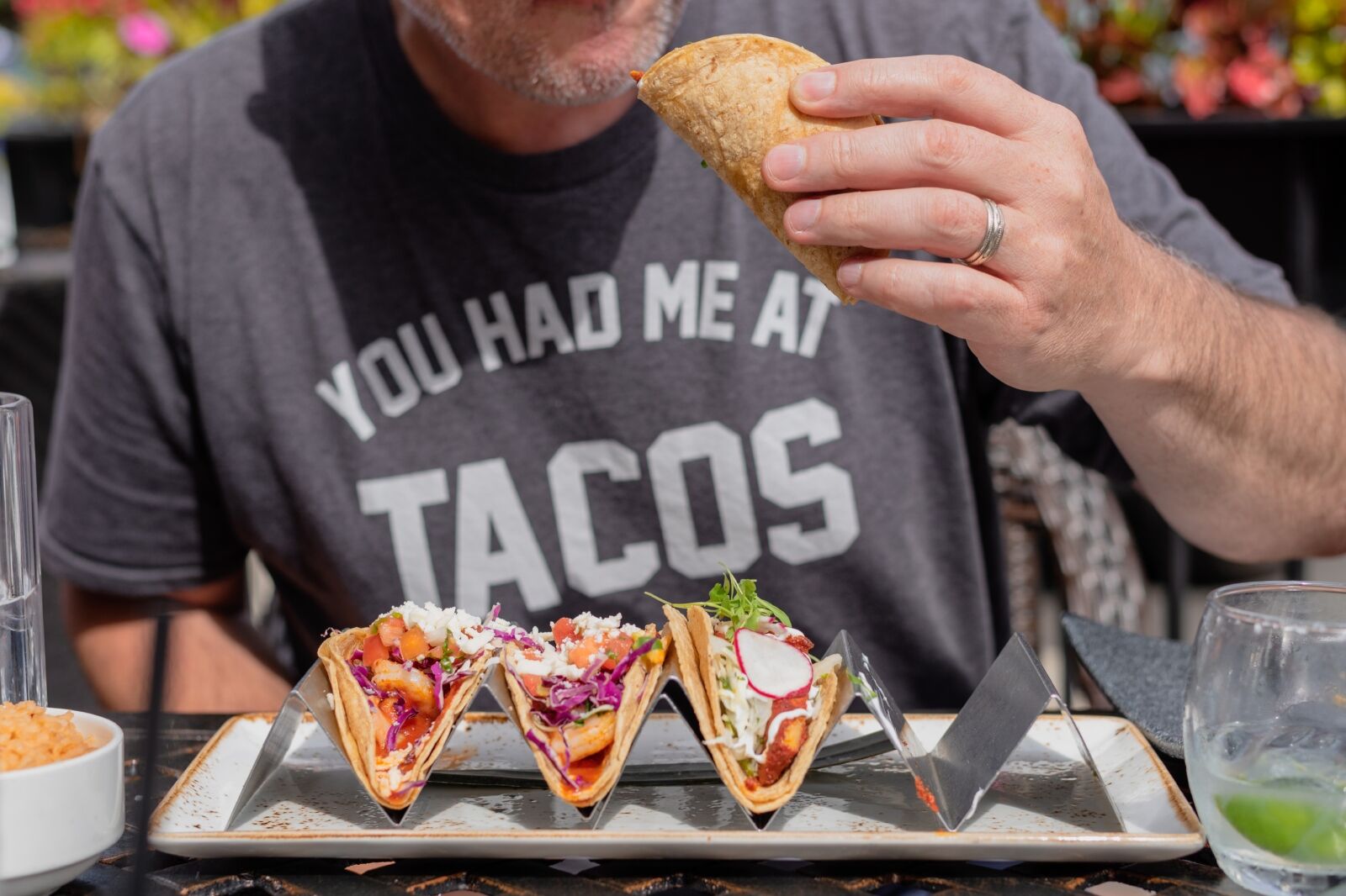 Man eating tacos

