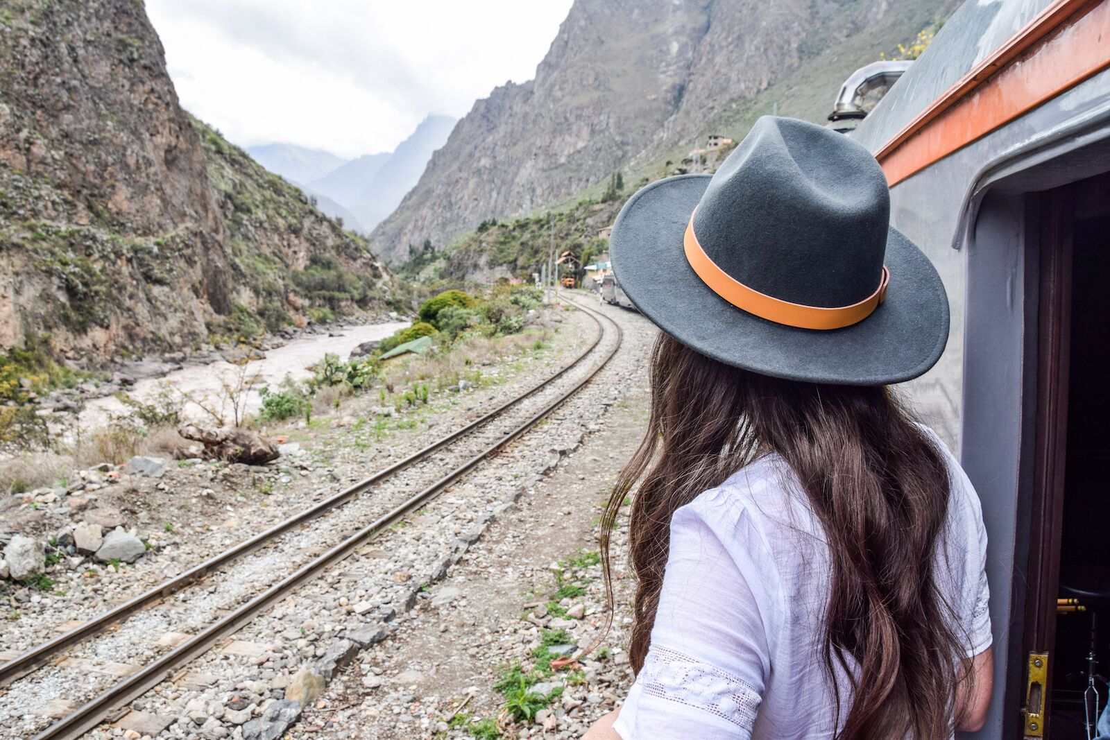 Inca rail - woman looking at train