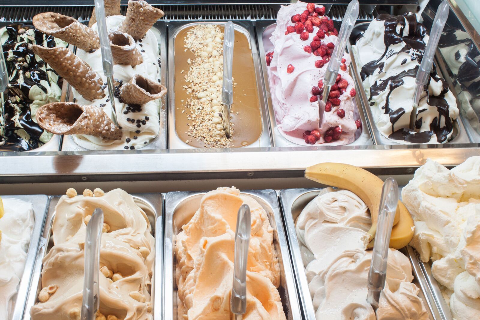 close up of gelato flavors in italian shop