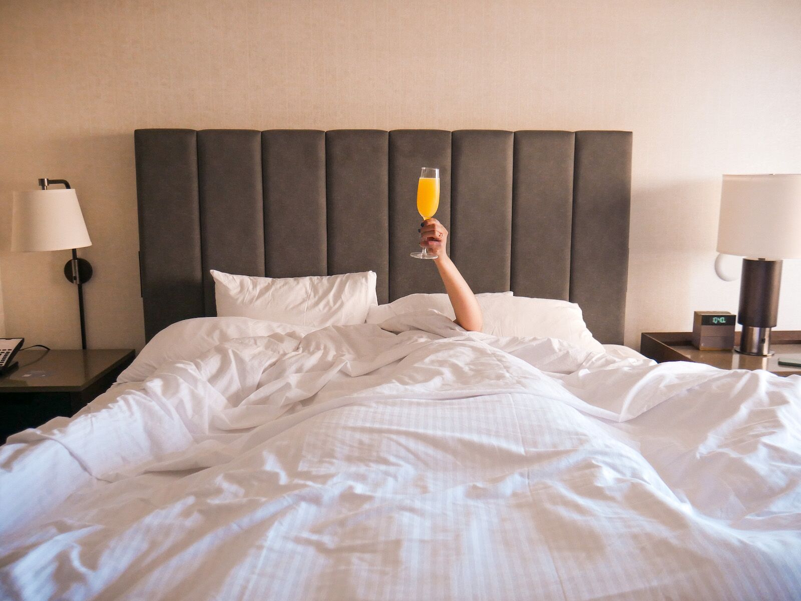 hotel bed with mimosa