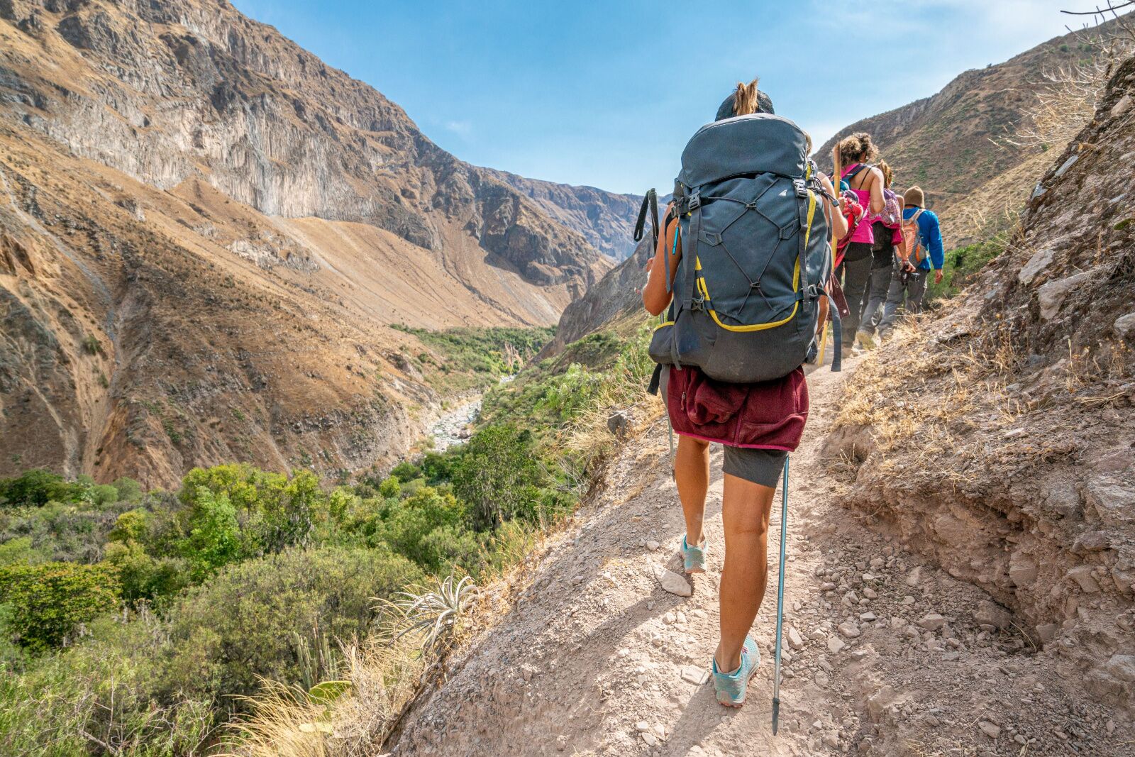 woman hiking to see andean condors colca canyon