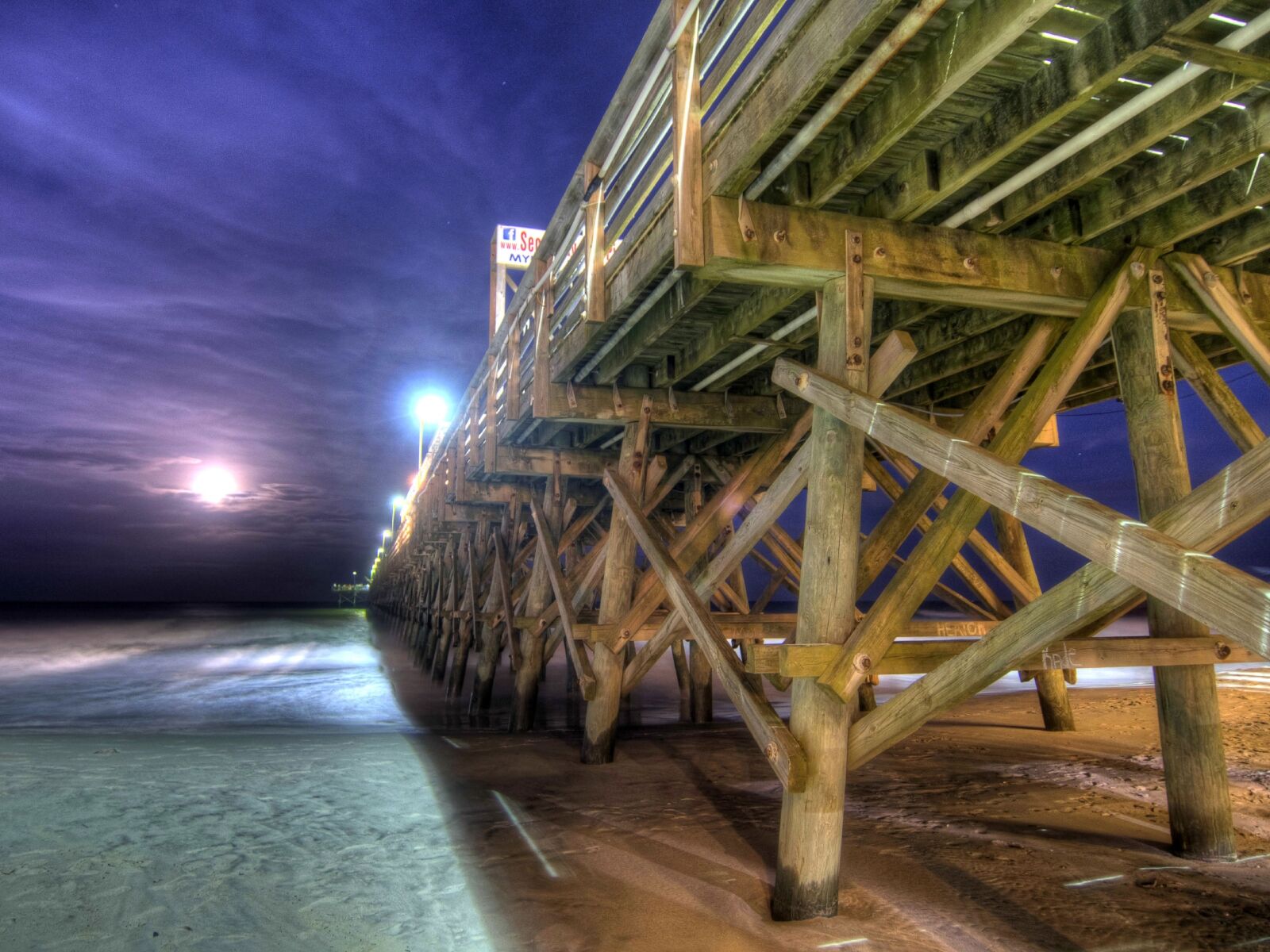 Image of pier at night
