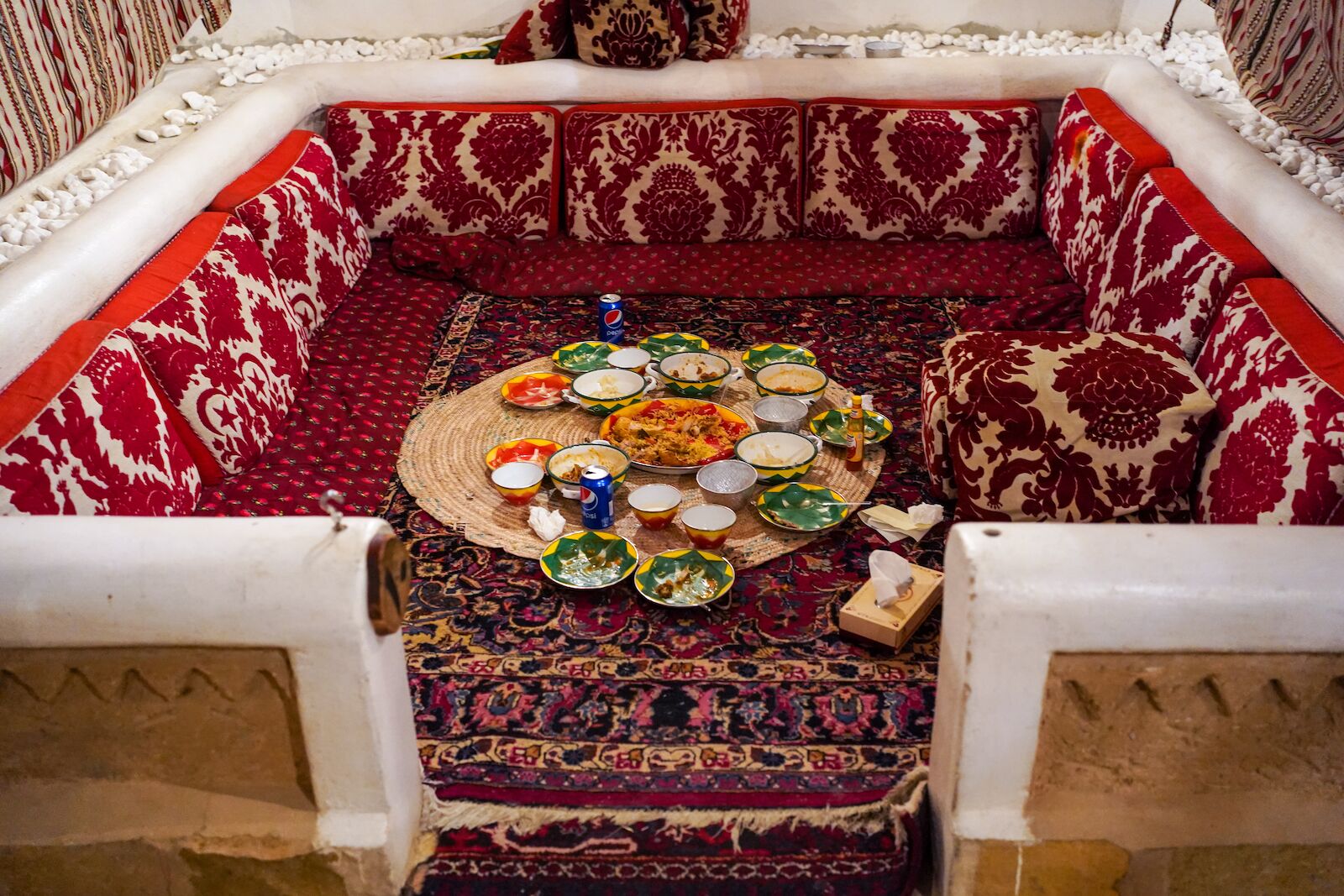 Riyadh / Saudi Arabia - January 8, 2020: Traditional Yemeni restaurant in the capital of Saudi Arabia, with compartments where families sit on the carpets and eat with their hands