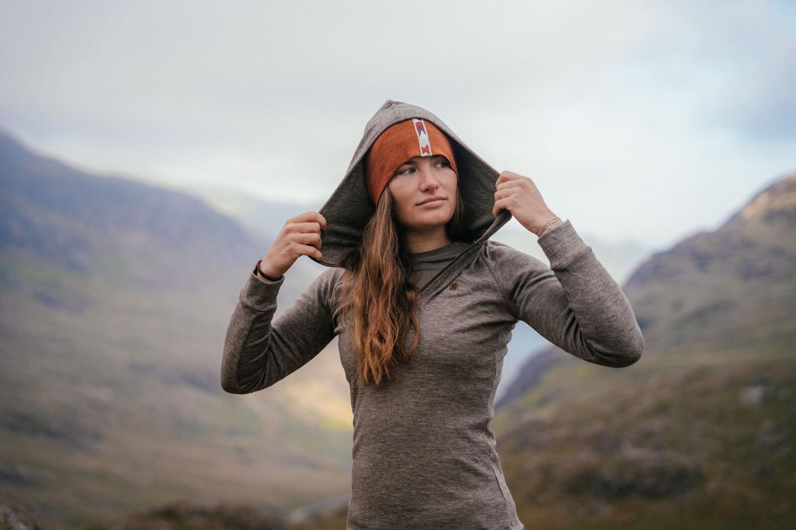 Woman outdoors wearing Kora outdoor gear 