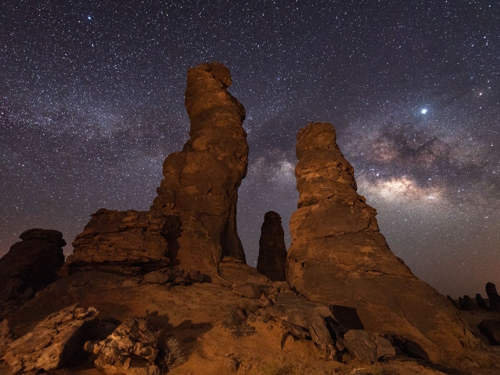 Stone formations with nightsky in AlUla