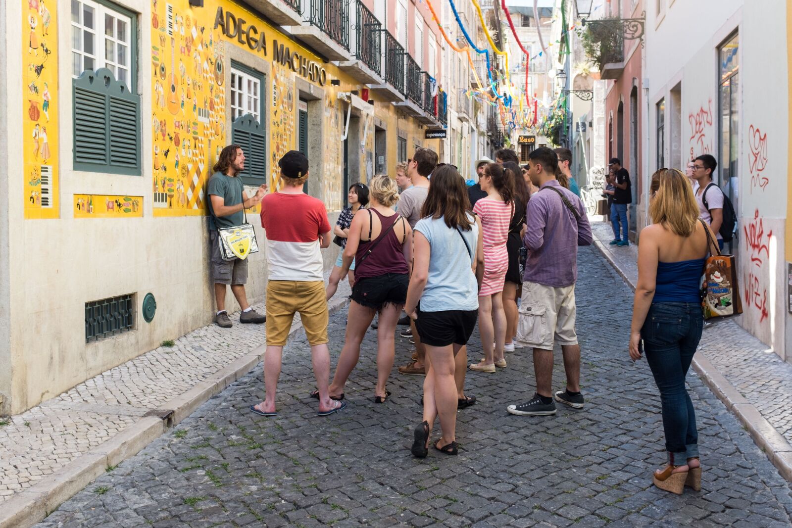 tourists on a free walking tour in lisbon 