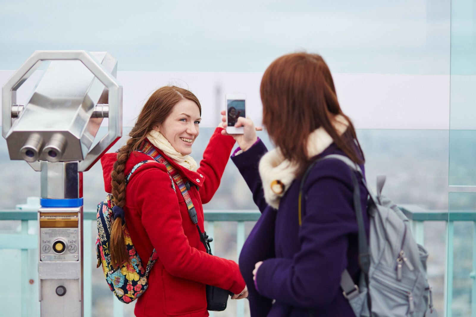 free walking tours - friends taking photos for each other on observation deck