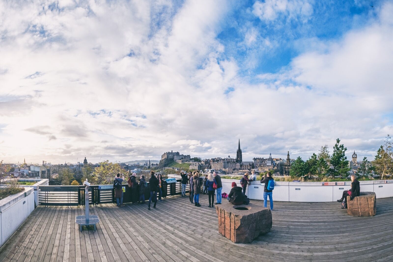 People enjoying themselves on the roof of the Scottish National Museum. Edinburgh, Scotland