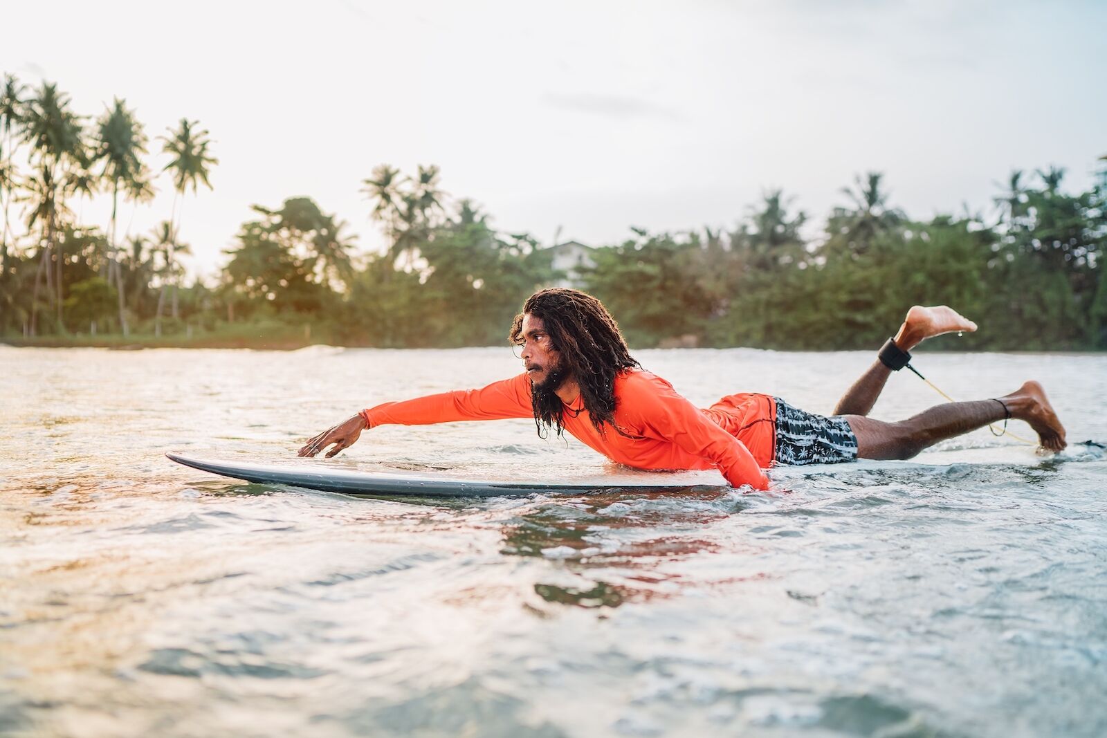 Man surfing in Hawaii