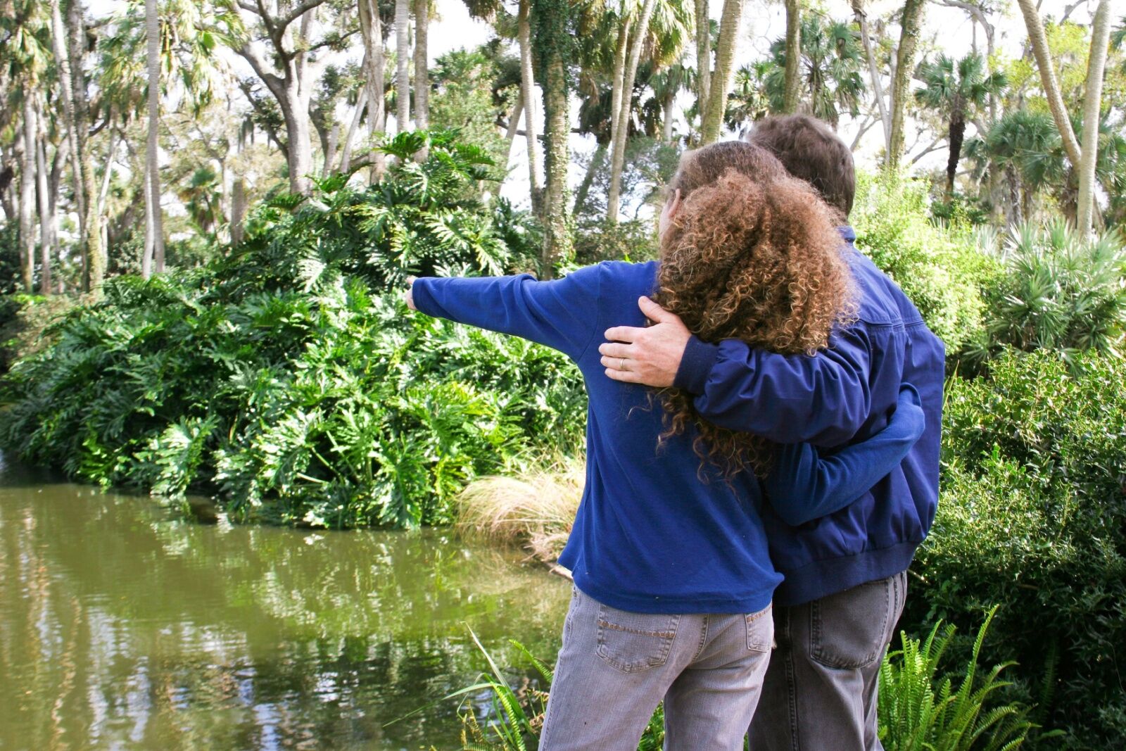 father and daughter in a swamp in florida