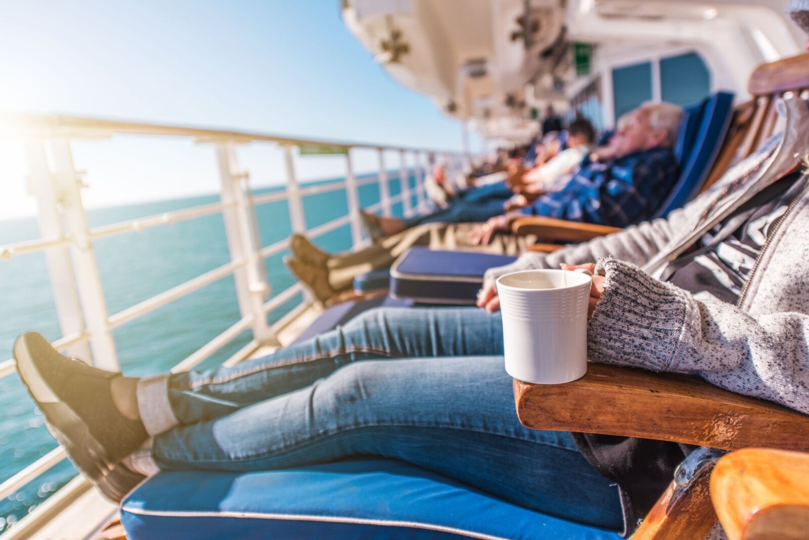 group of people on cruise chairs