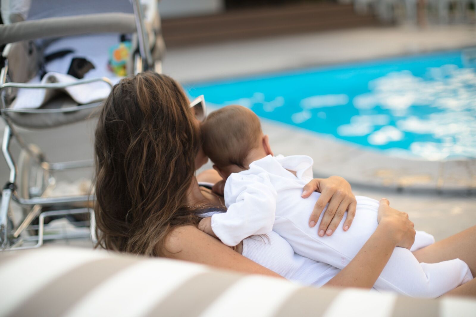 postnatal retreat - mom and baby at pool