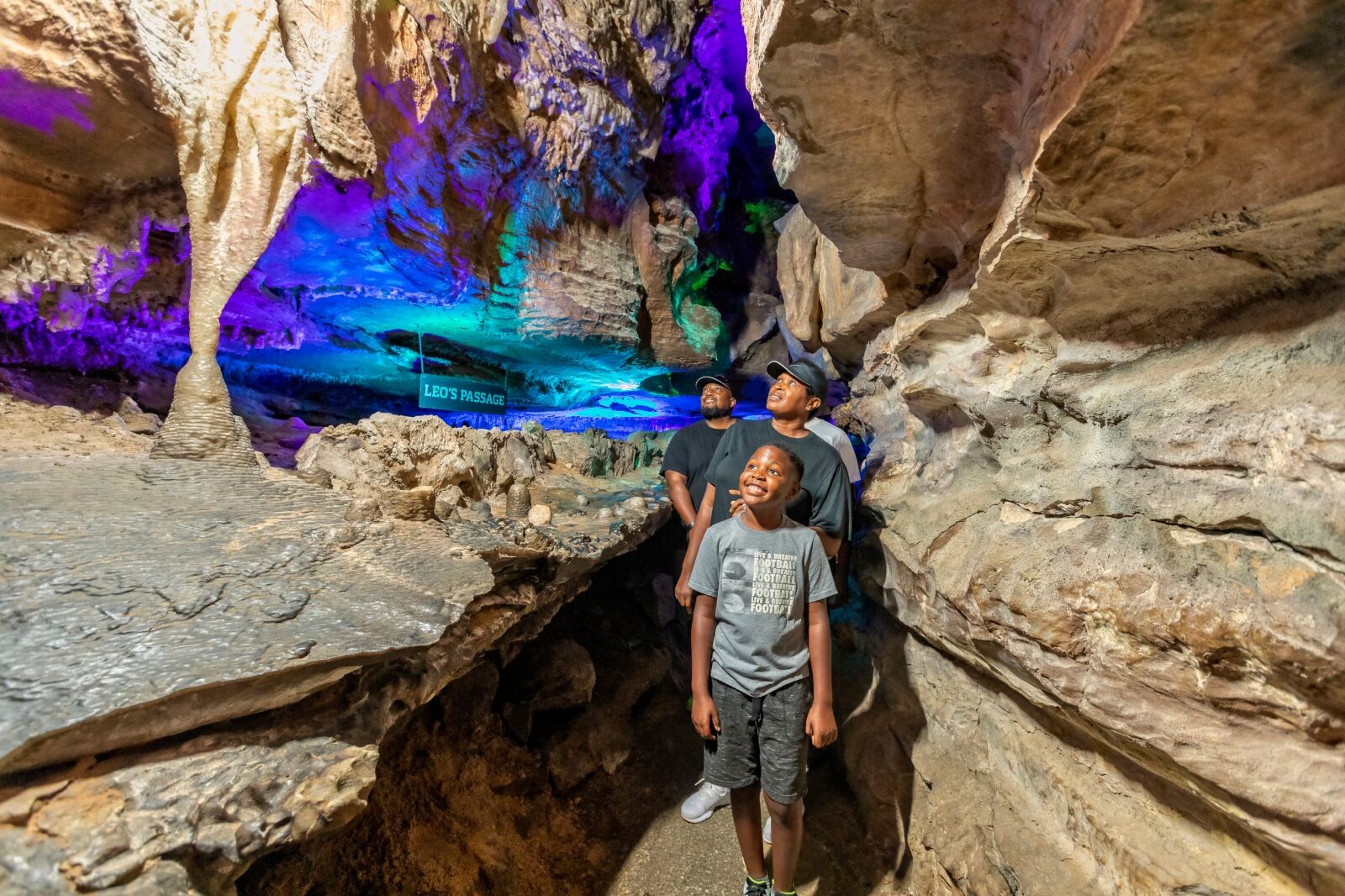 People walk through the cave at Ruby Falls 
