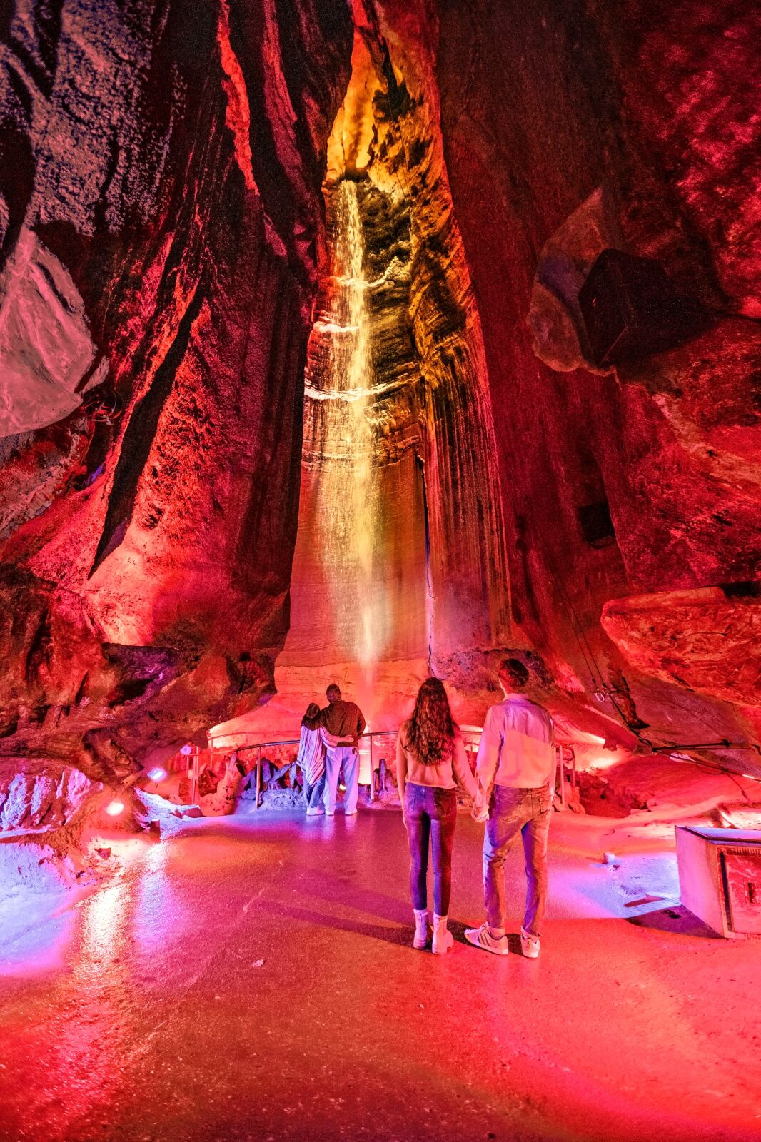 Couples stand in front of Ruby Falls 