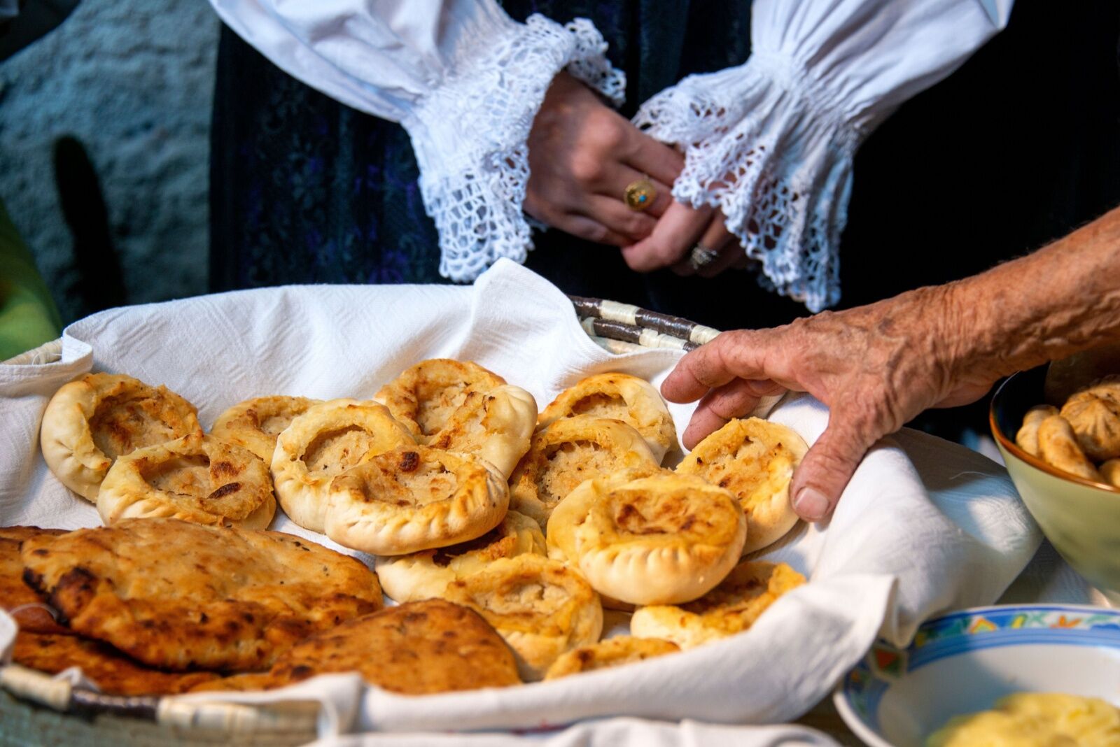 panadas, typical Sardinian savory pies, filled with meat, potatoes and legumes