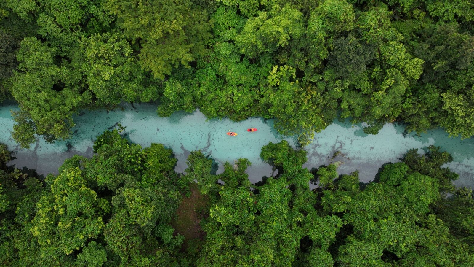 air vanuatu cancelled - kayakers on a blue hole