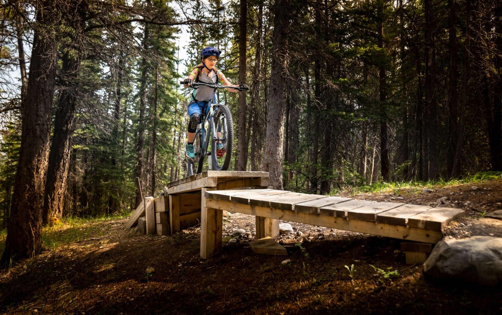 mountain bike park - woman on feature