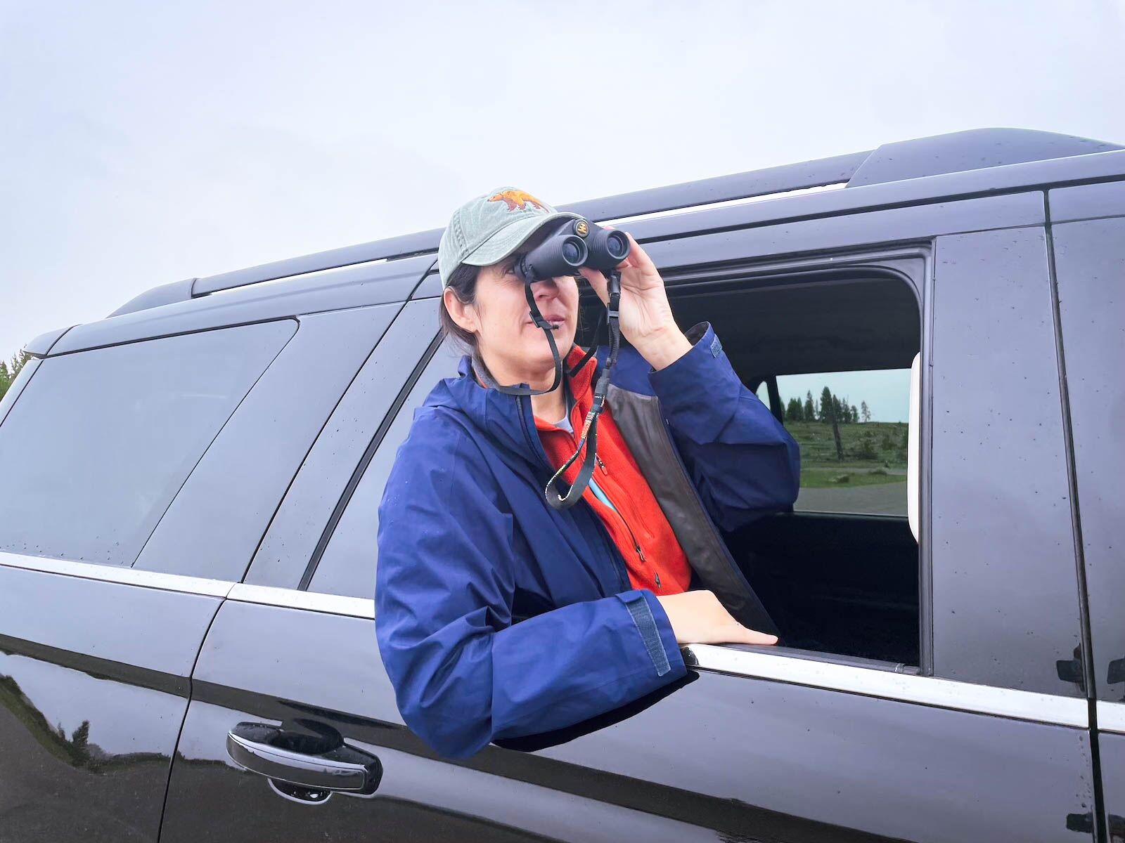 nocs travel binoculars from a car