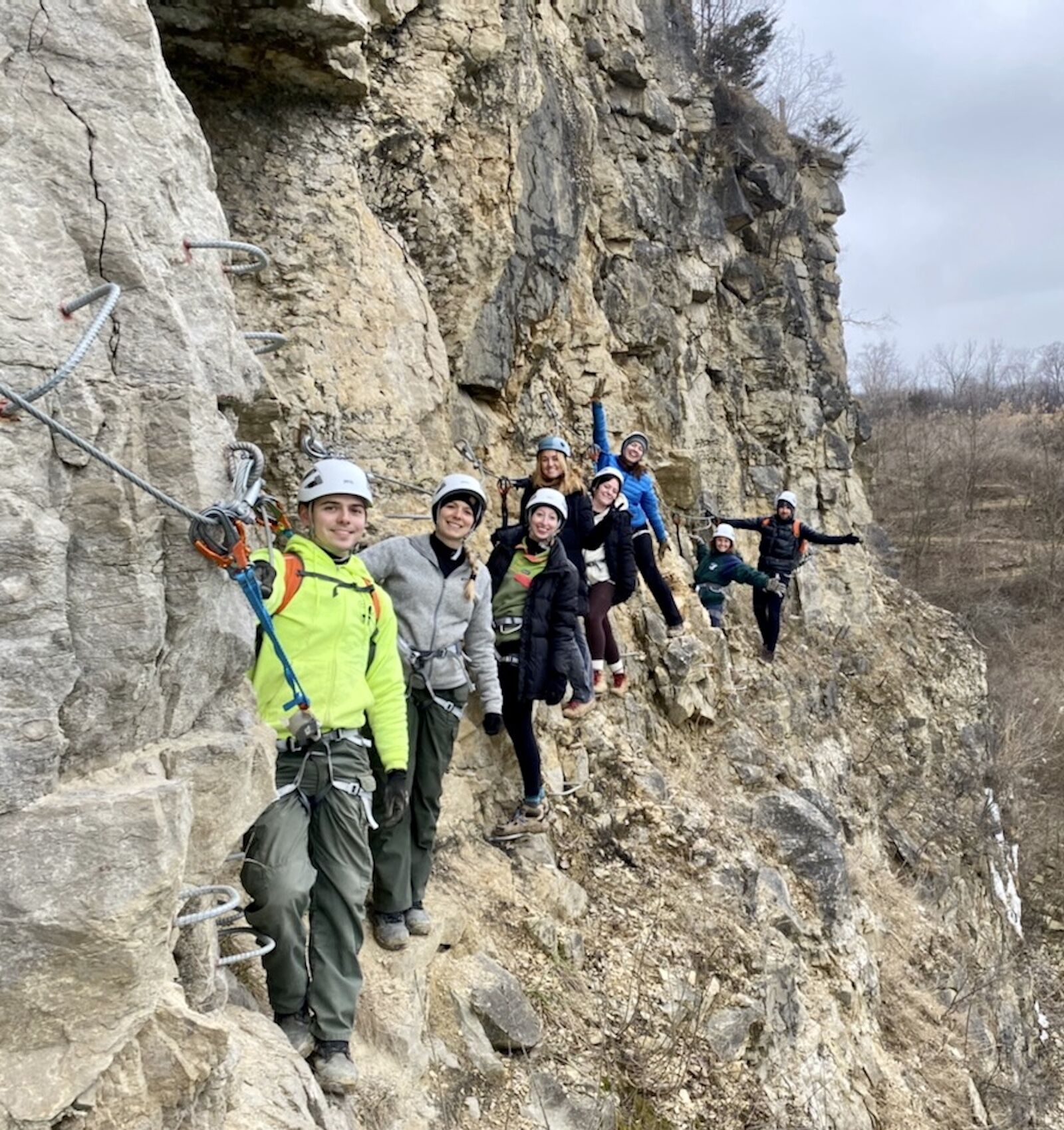 climbers on quarry trails via ferrata
