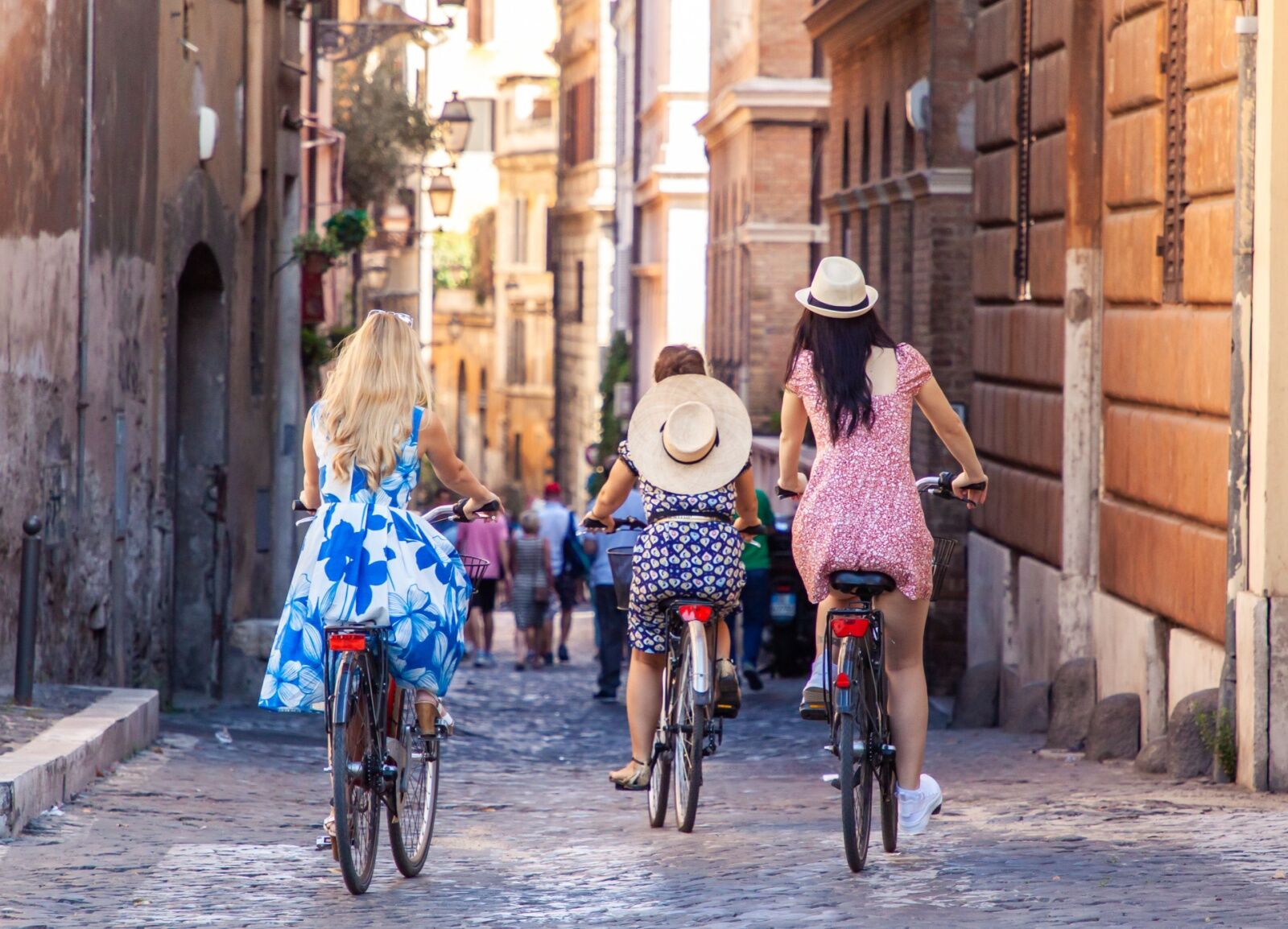 sober travel - women cycling in italy
