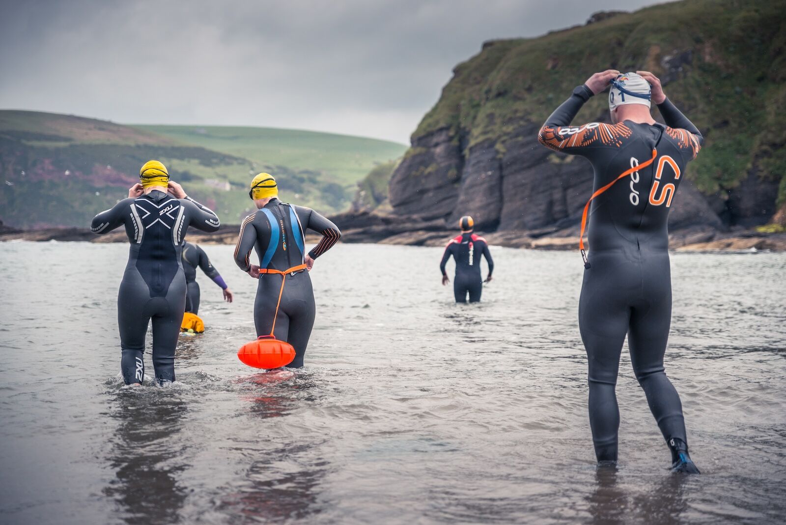 Wild Swimmers in Cullykhan bay, Scotland.