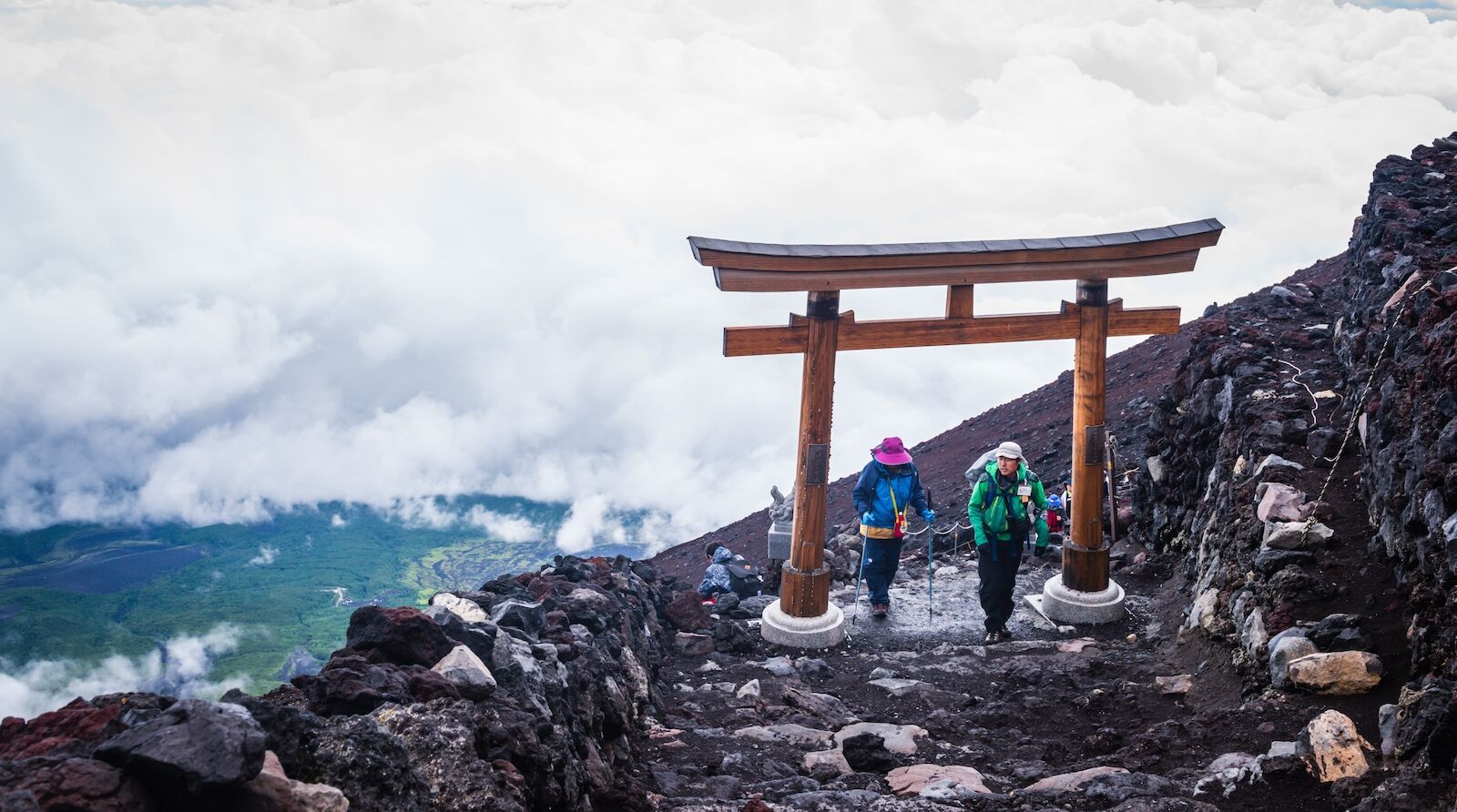 mount fuji tourist tax - hikers on summit