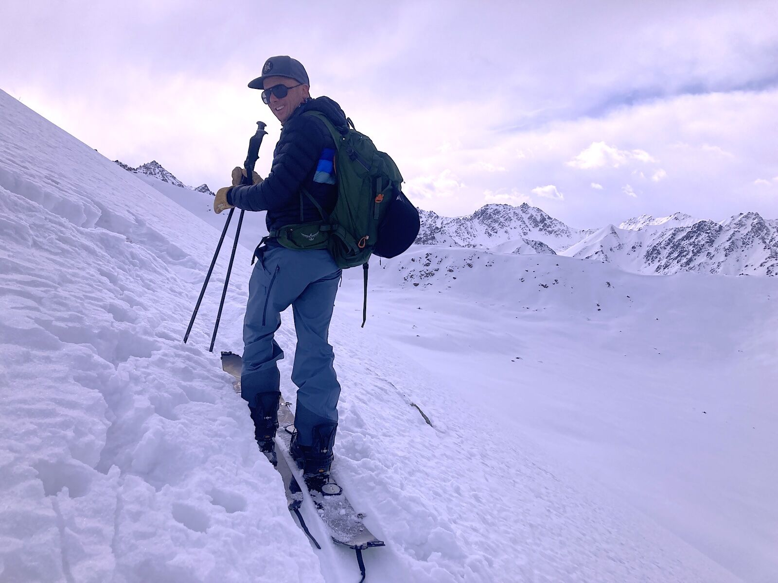 man splitboarding in kyrgyzstan