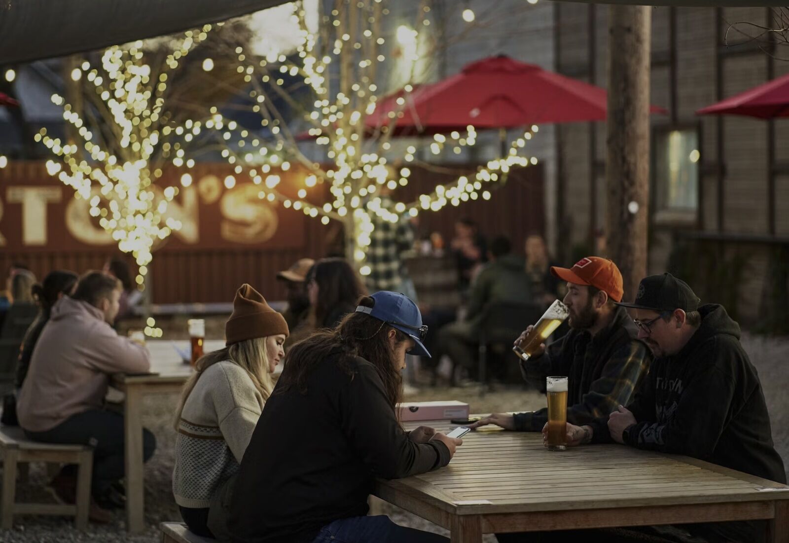 people on patio at TF Brewing